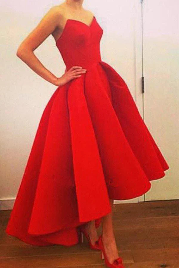 Back view of the A-line sweetheart strapless satin prom dress, showing ruffled high-low skirt.