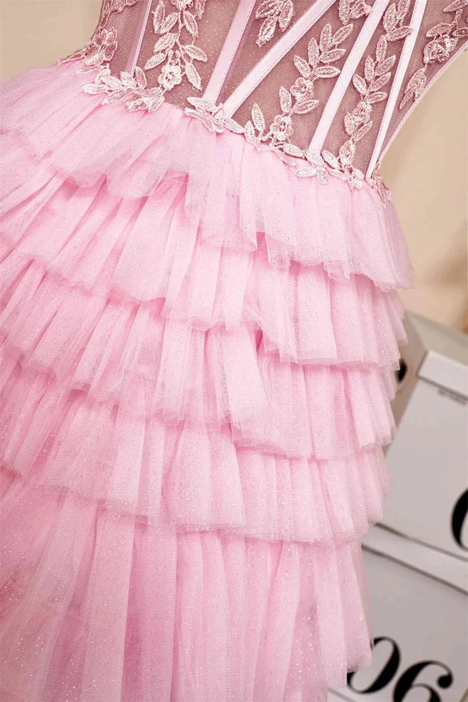 Back view of a short pink sweetheart neckline homecoming dress.