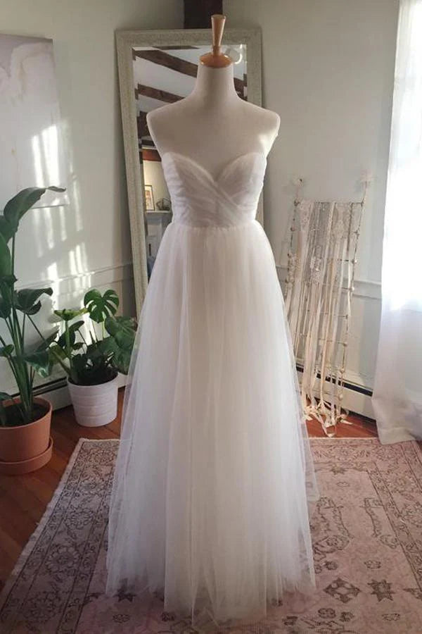 Elegant A-line sweetheart strapless wedding dress with open back.