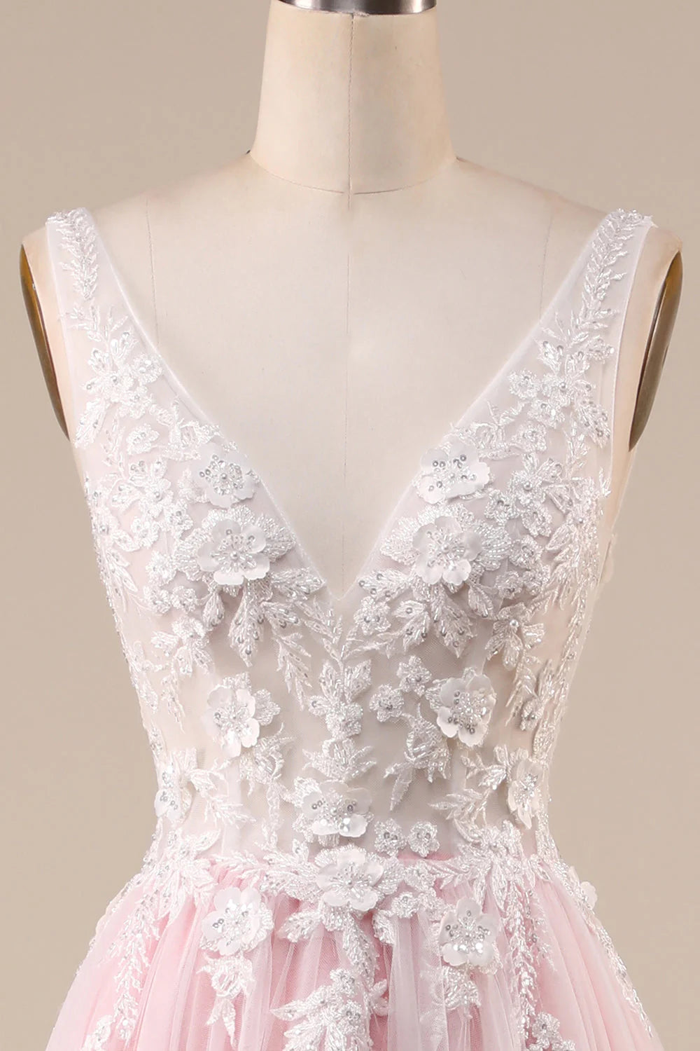 Side profile of a strapless A-line bridal dress in ivory pink, highlighting the silhouette.