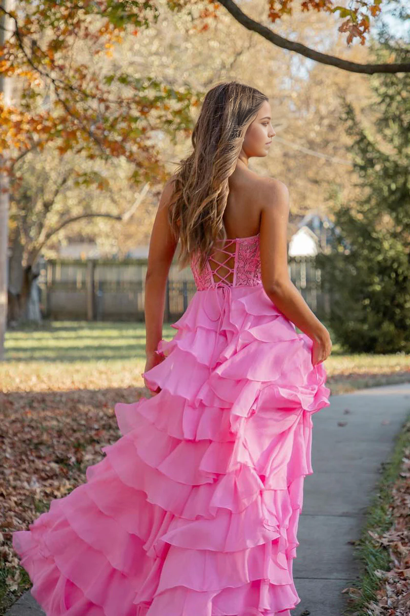 Back view of the hot pink tiered chiffon prom dress.