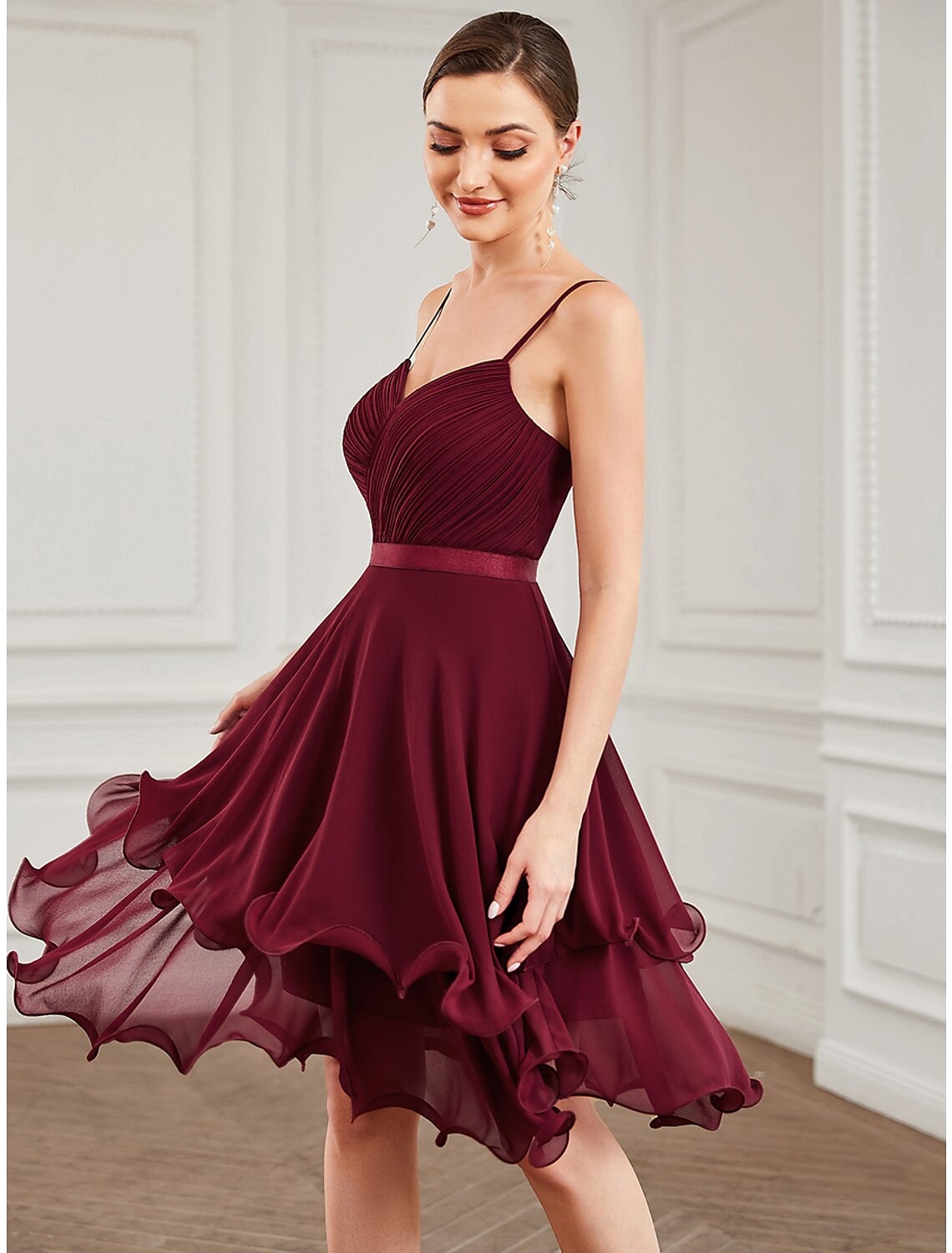 Back view of the A-line sweetheart tiered chiffon short homecoming dress.