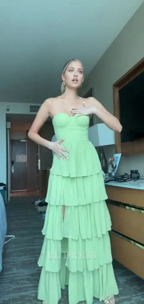 Mint green A-line tiered dress with sweetheart neckline, suitable for formal events.