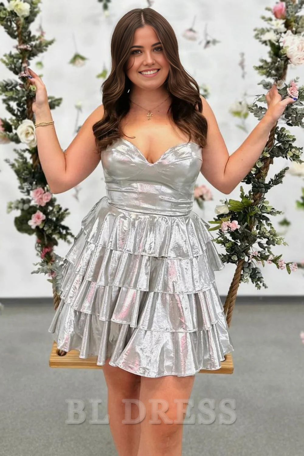 Side view of the A-line sweetheart tiered formal dress.