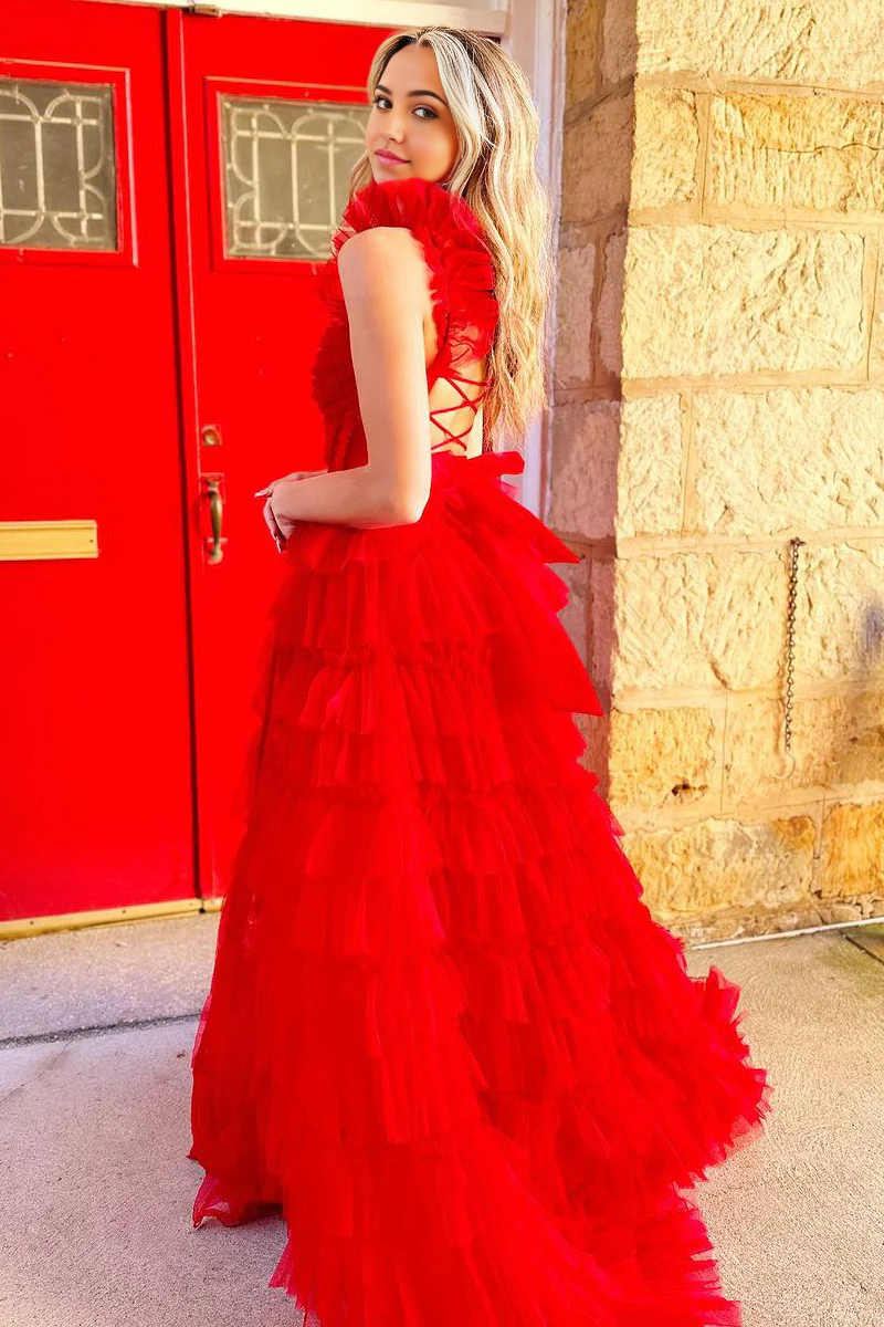 Back view of the long A-line tiered tulle prom dress, showcasing its flowing silhouette.