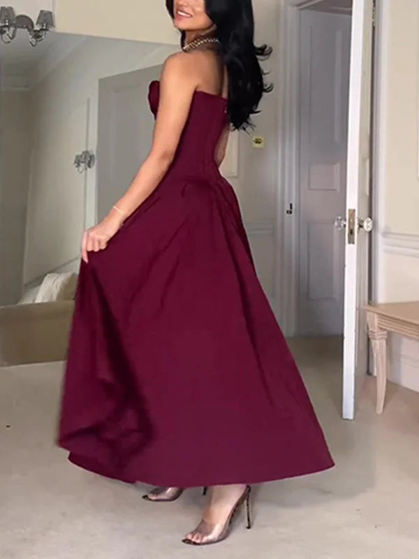 Close-up of the sweetheart V-neckline on the burgundy formal dress.