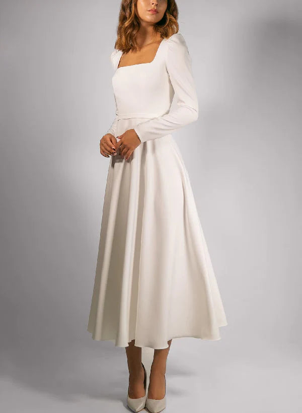 Elegant A-line tea-length wedding dress with a square neckline.