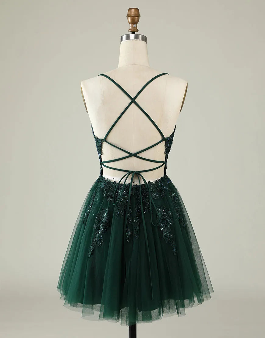 Back view of the A-line tulle dress showcasing the intricate corset lacing.