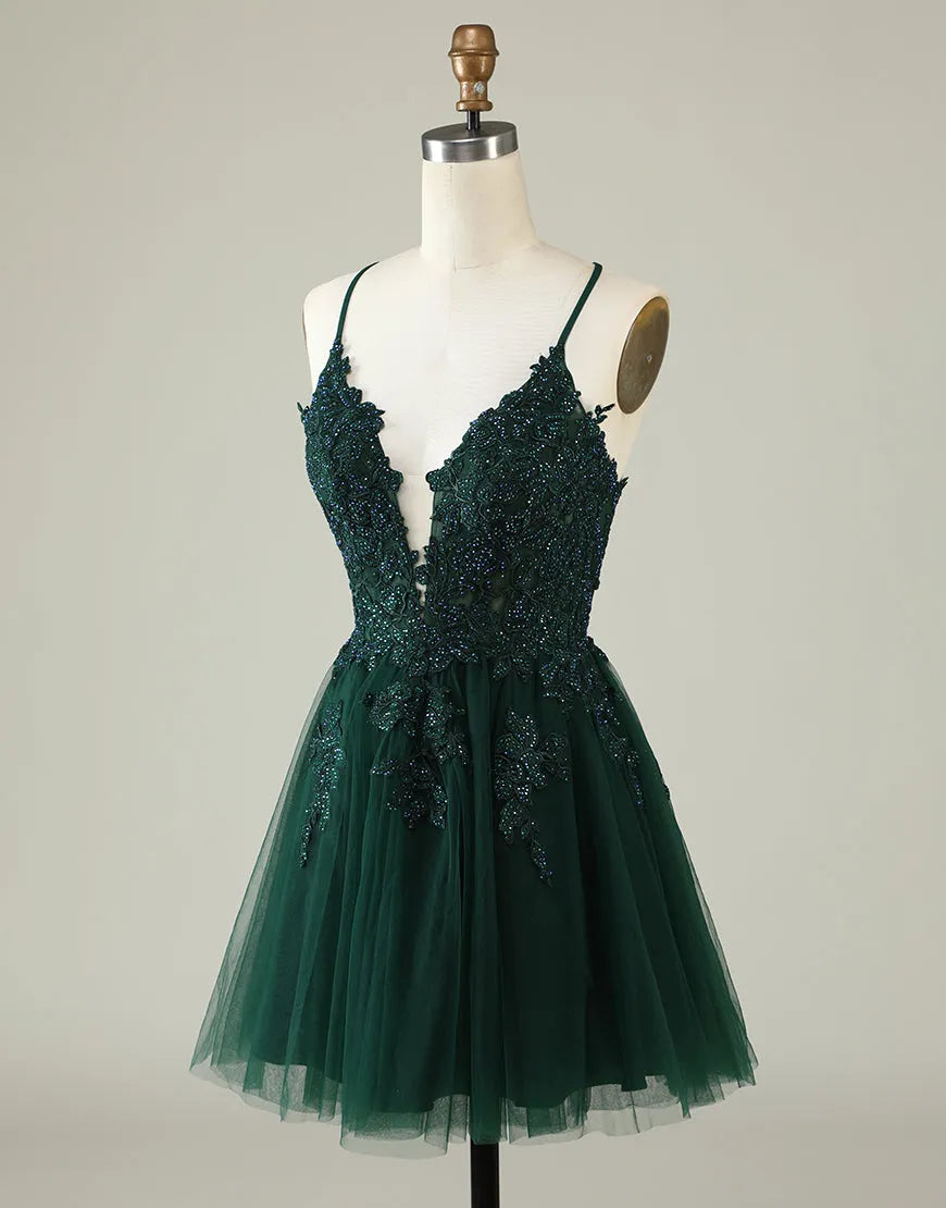 Side view of the A-line dress, highlighting the flowing tulle skirt and appliques.