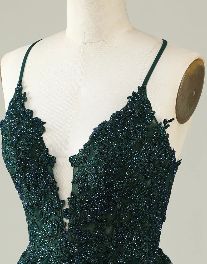 Close-up of the delicate floral appliques on the bodice of the A-line dress.