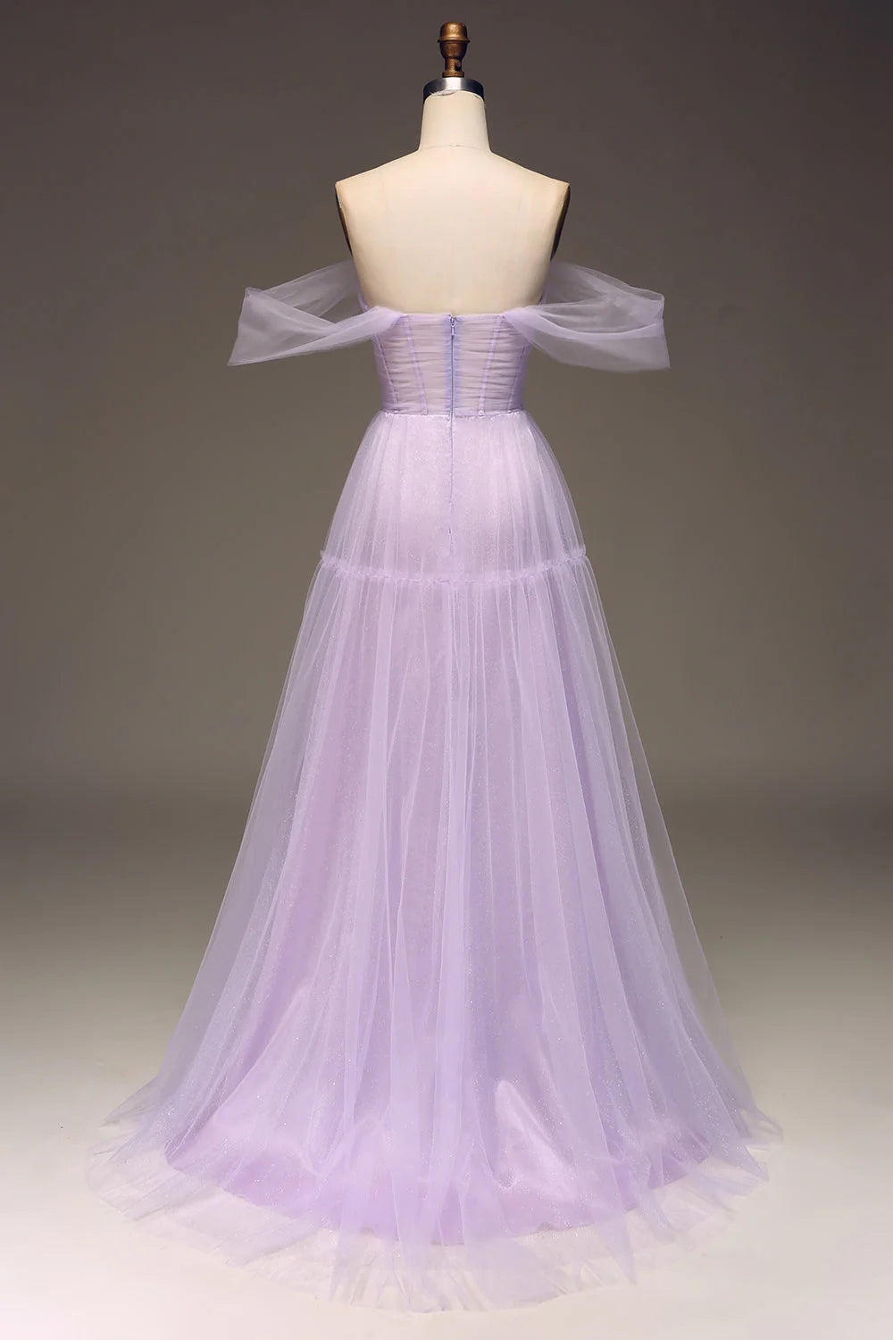 Back view of a flowing lilac A-line tulle gown.