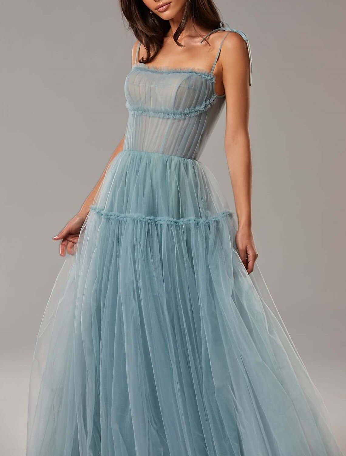 Full view of the A-line prom dress, highlighting its flowing silhouette.