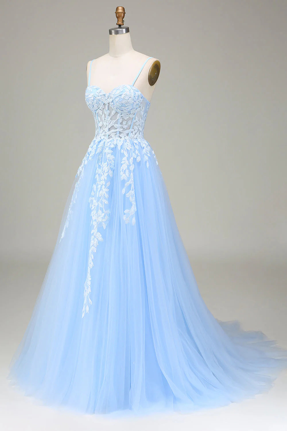 Back view of the A-Line tulle prom dress showing spaghetti straps.