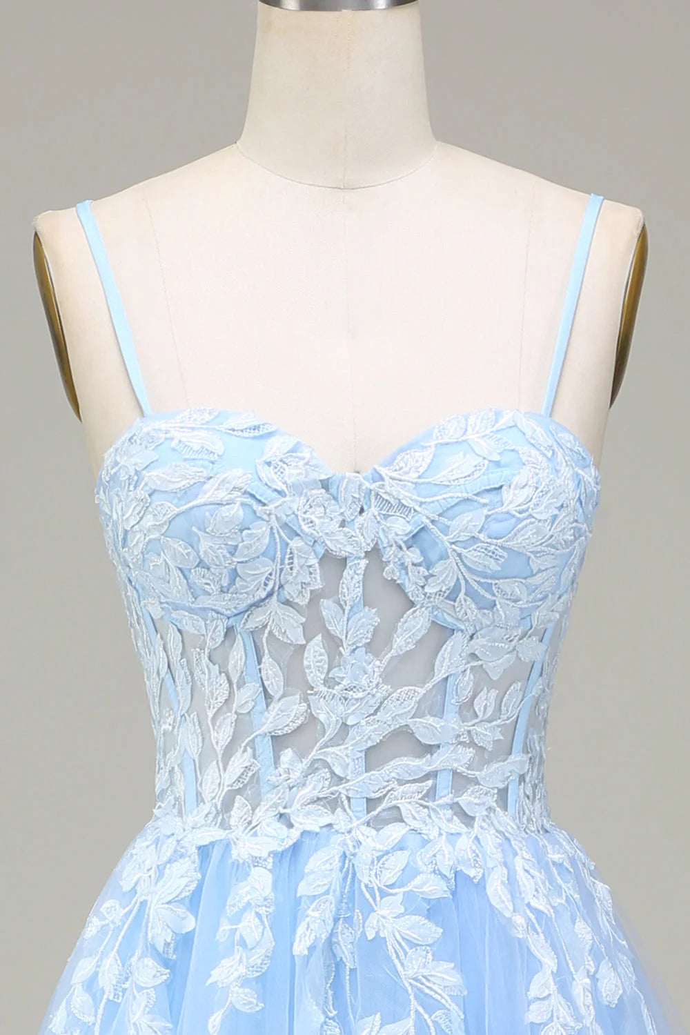 Side view of the A-Line tulle prom dress highlighting the flowing skirt.