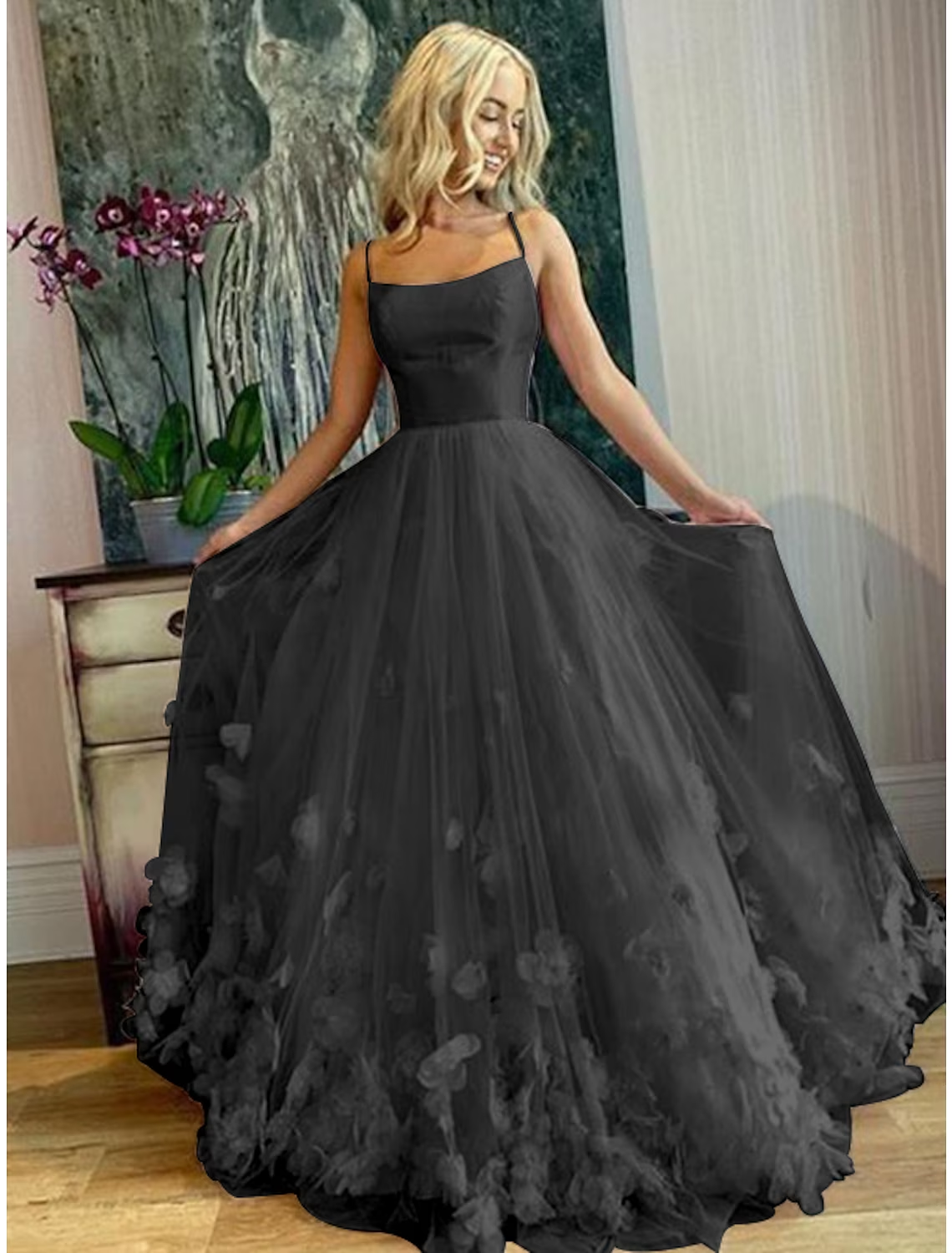 Full view of the A-line prom gown, highlighting the tulle fabric and silhouette.