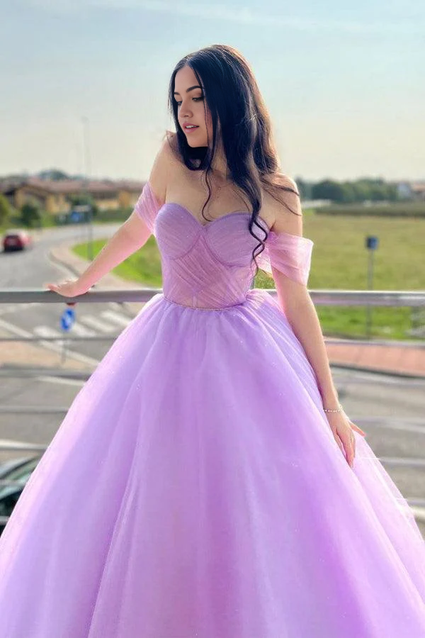 Elegant purple tulle gown for formal occasions.