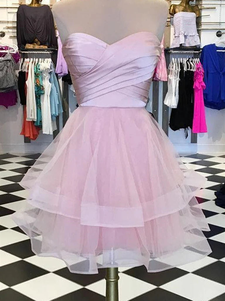 Elegant A-line tulle dress with sweetheart neckline, suitable for prom or homecoming.