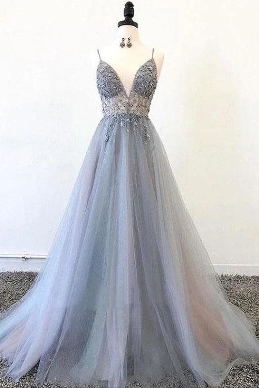 Elegant A-line tulle prom dress with V-neck, spaghetti straps, and appliques.