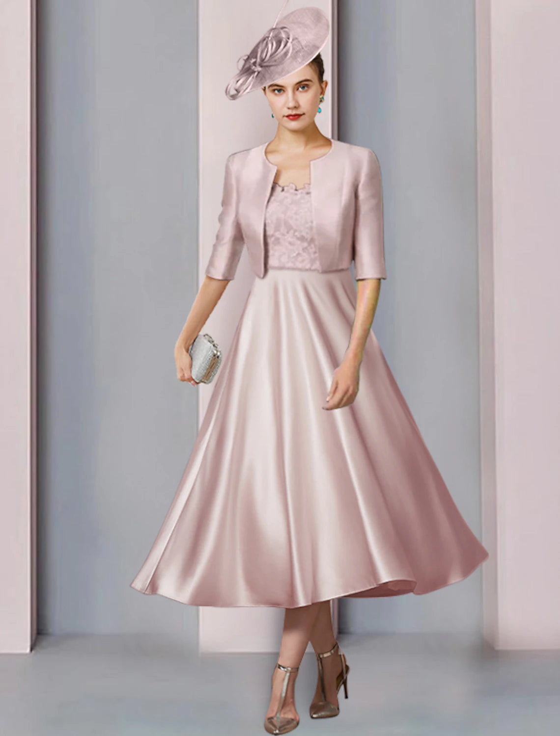 Elegant A-Line two-piece Mother of the Bride dress with scoop neck and half sleeves.