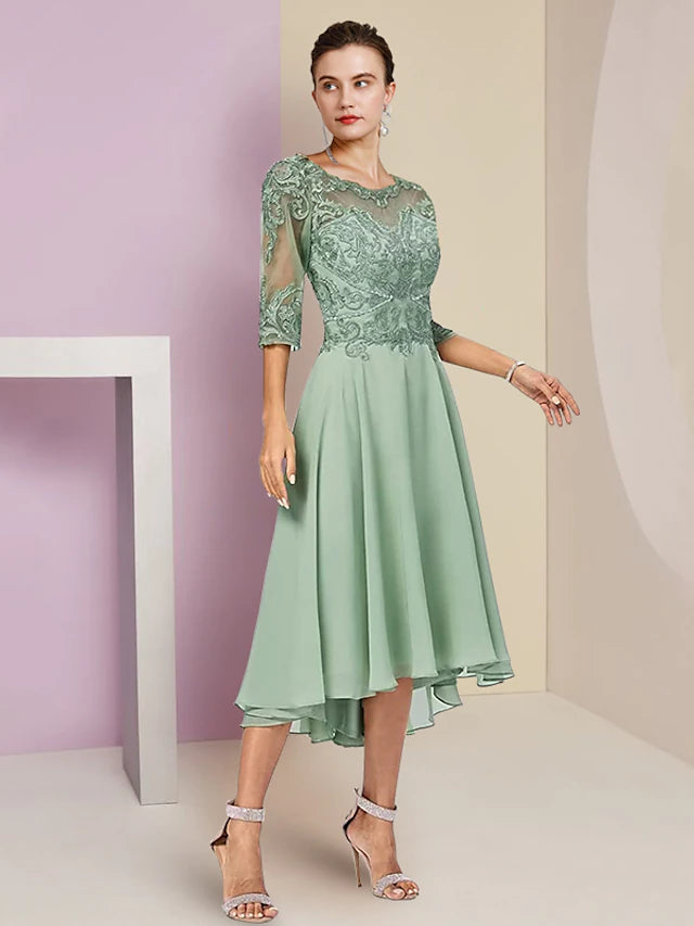 Detailed view of the high-low hemline and intricate lace appliques on the chiffon skirt.