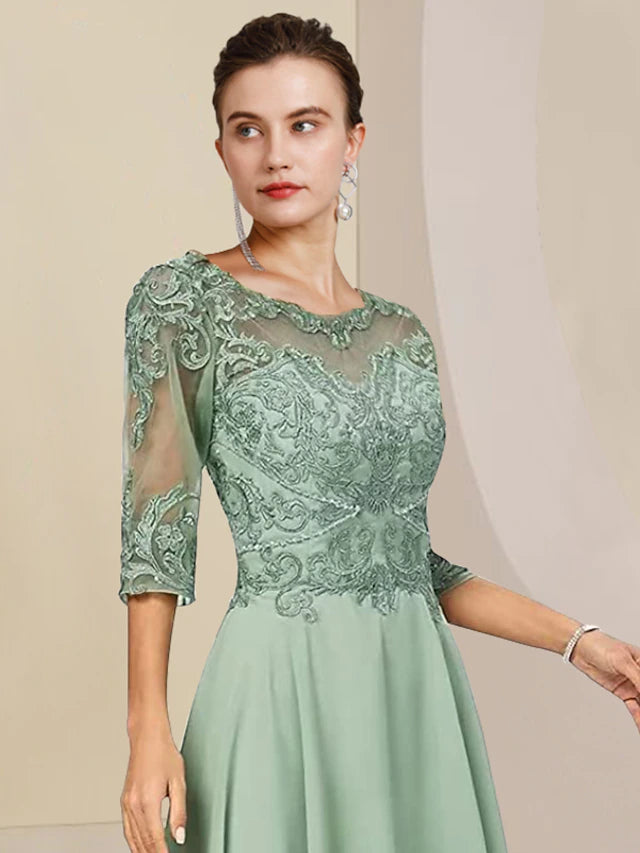 Woman walking gracefully in the formal slate blue dress, demonstrating its elegant movement.