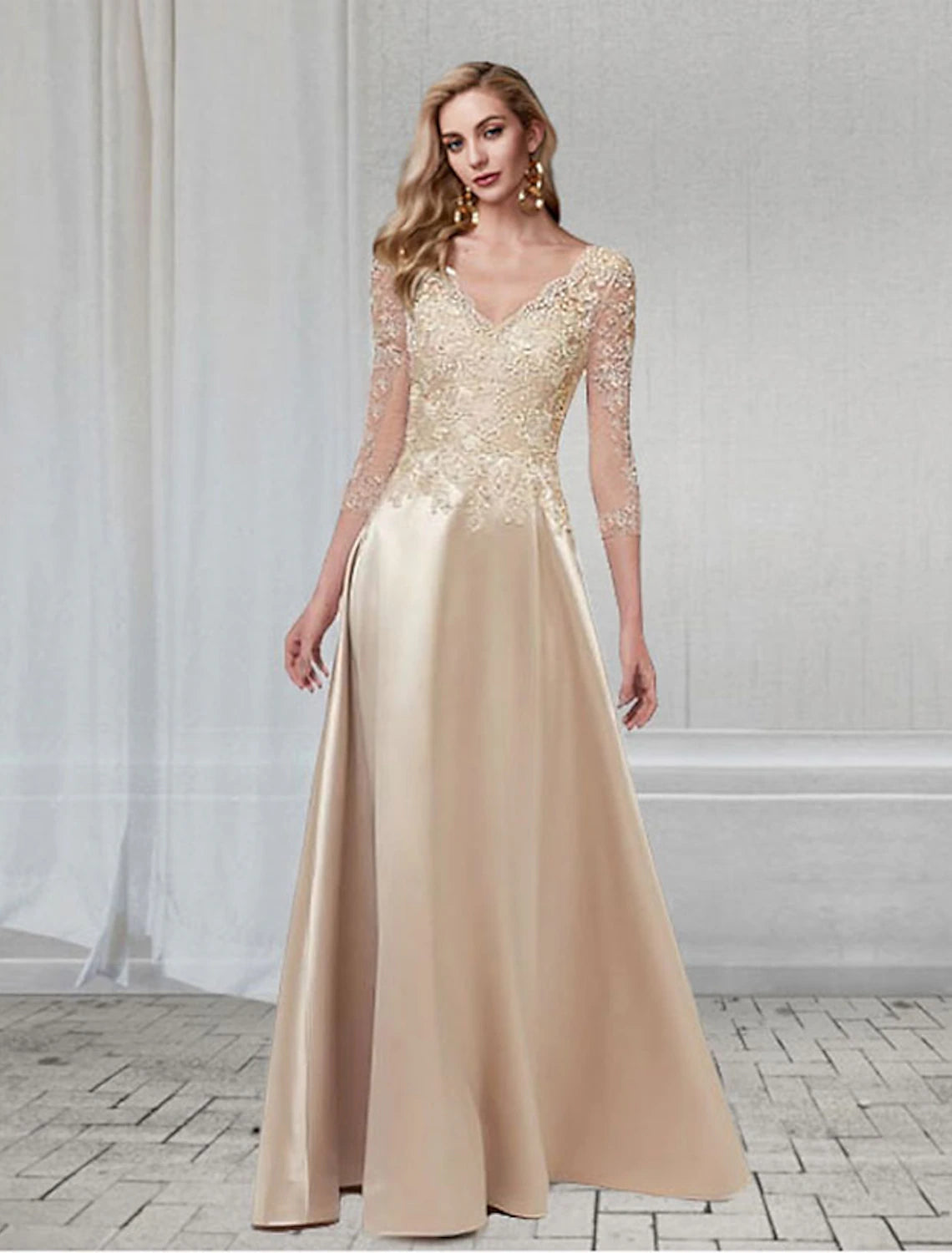 Elegant A-line V-neck chiffon dress with 3/4 sleeves and appliques.