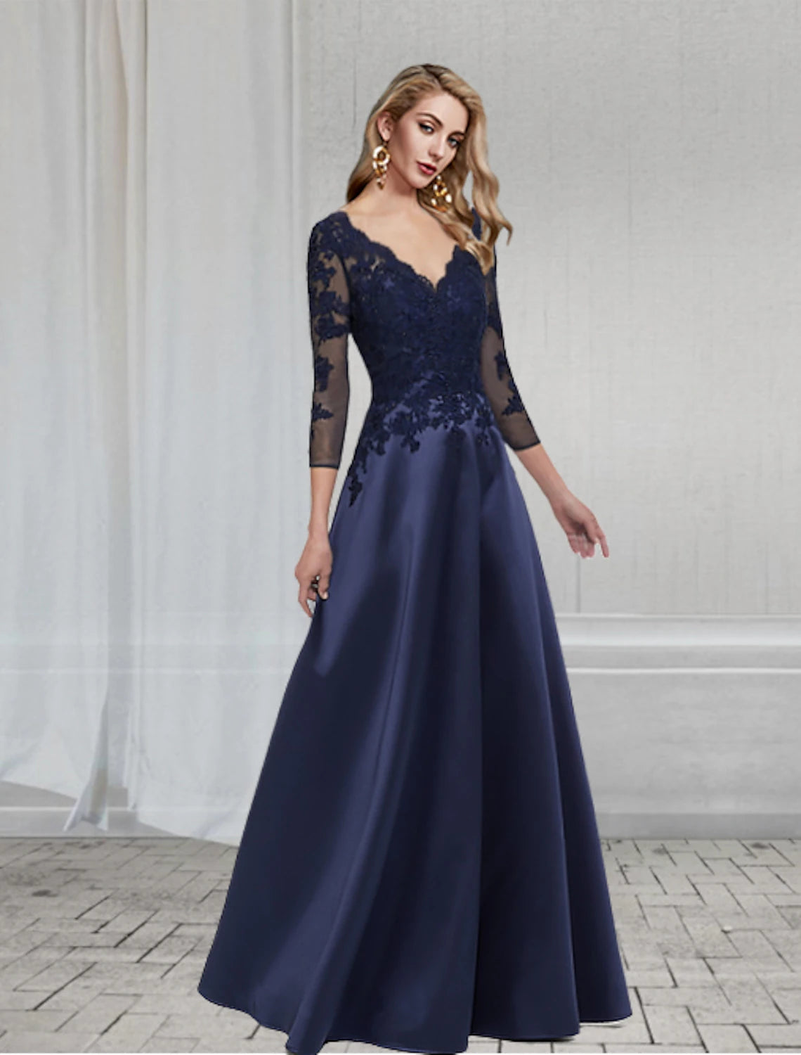 Close-up of delicate appliques on the chiffon dress.