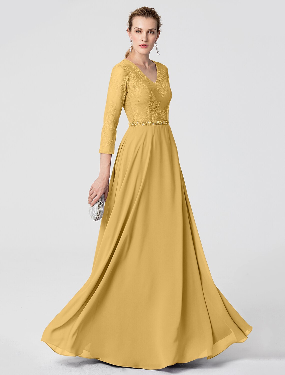 Chiffon and lace gown with delicate beading and sash.