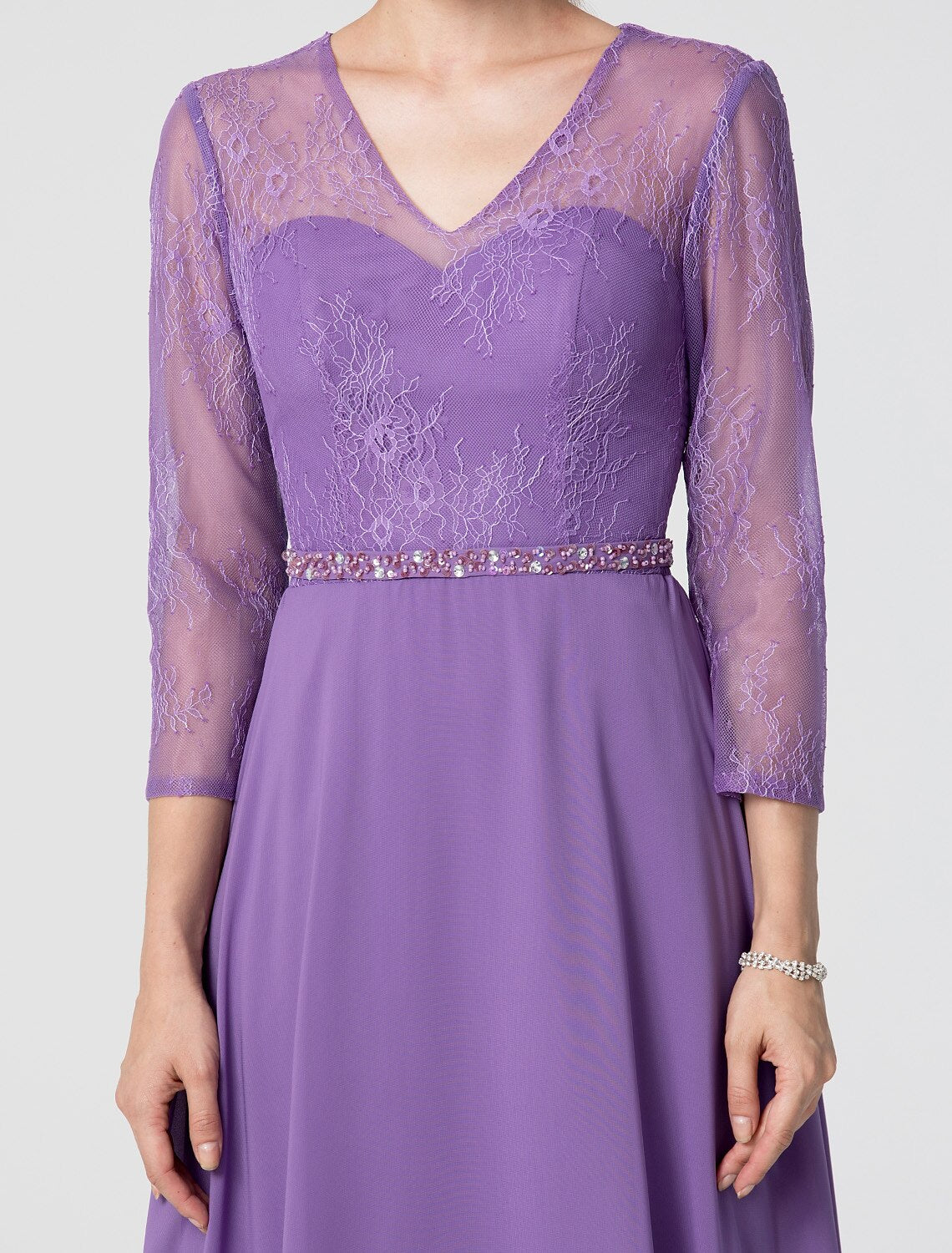 V-neck evening gown with elegant 3/4 sleeves.