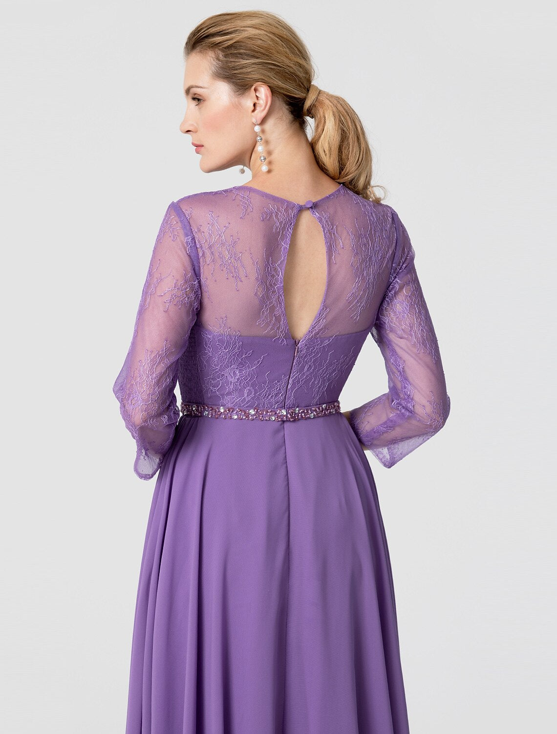 Floor-length chiffon dress with lace details.