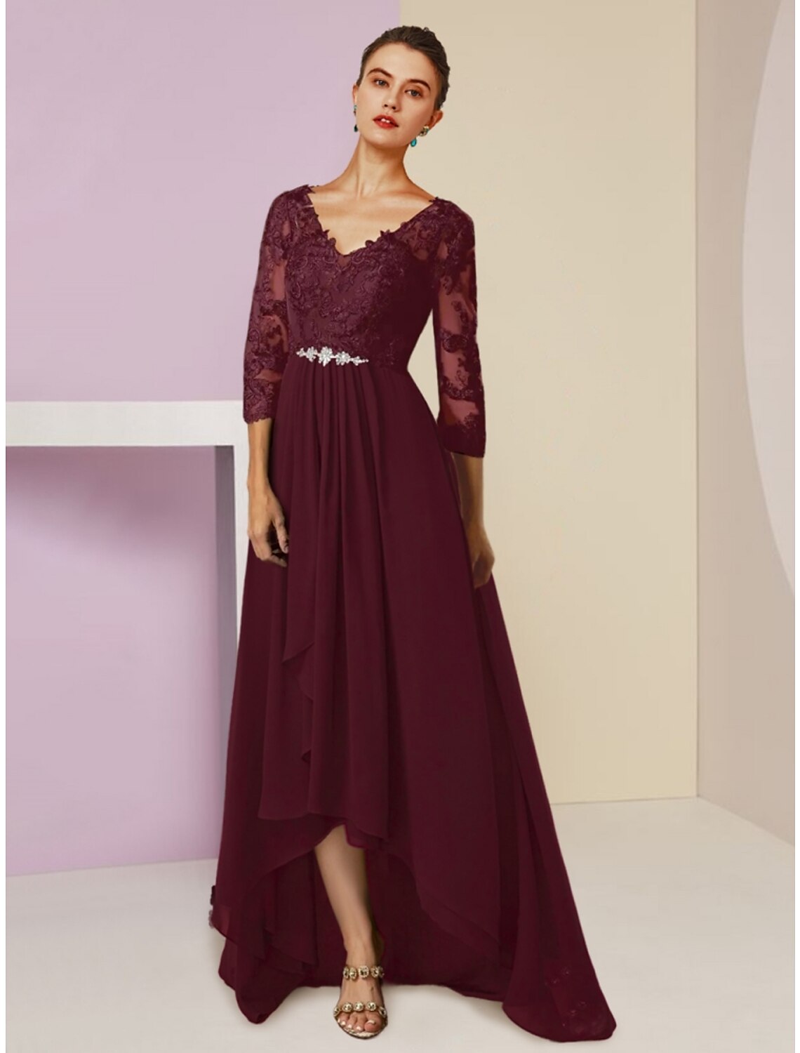 Model wearing an elegant navy A-line chiffon dress with V-neck and 3/4 sleeves.