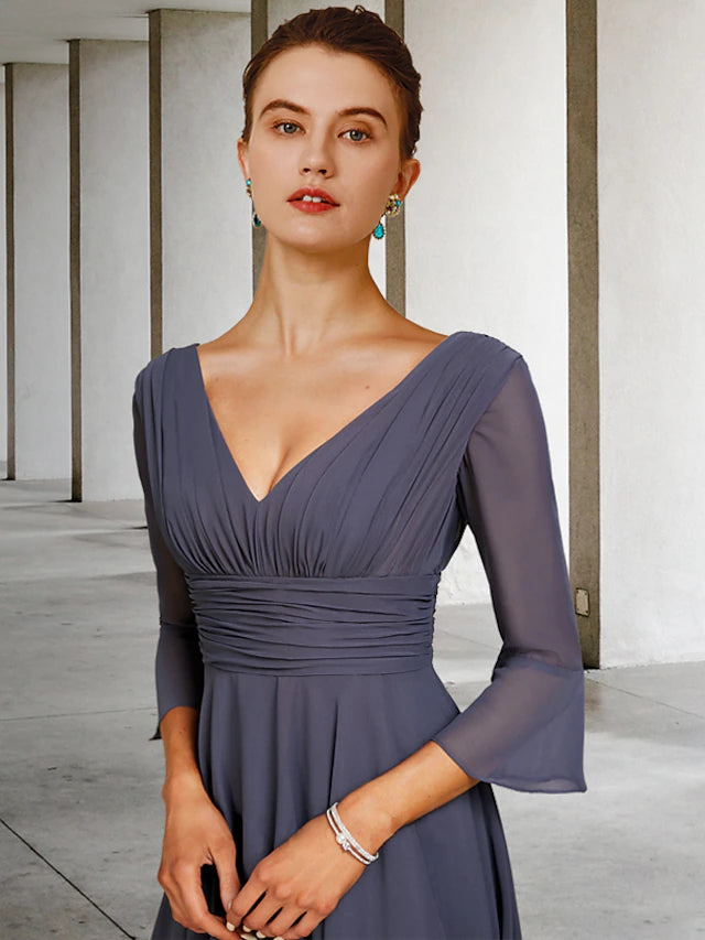 Back view of the A-line high-low chiffon dress, showing asymmetrical hem.