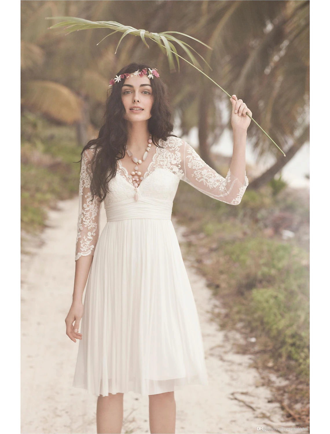 Elegant A-line V-neck white chiffon dress with 3/4 sleeves and ruched details.