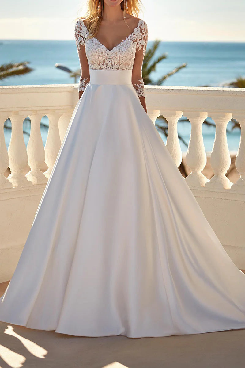 Elegant A-line V-neck satin wedding dress with 3/4 sleeves.