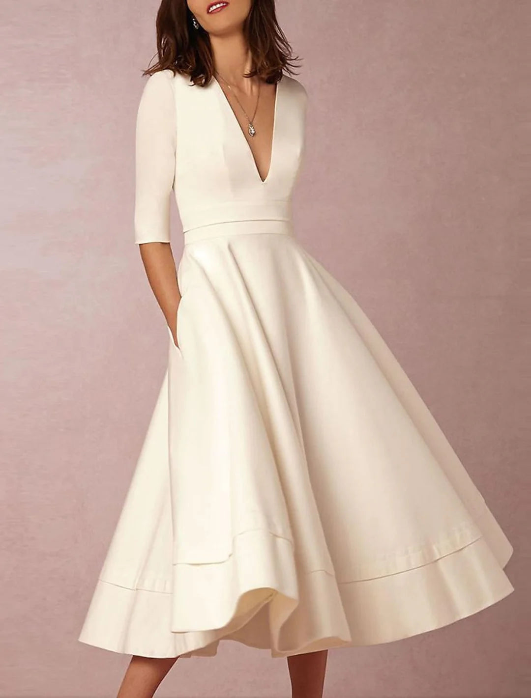 Elegant A-Line V-Neck ankle-length wedding dress with long sleeves.