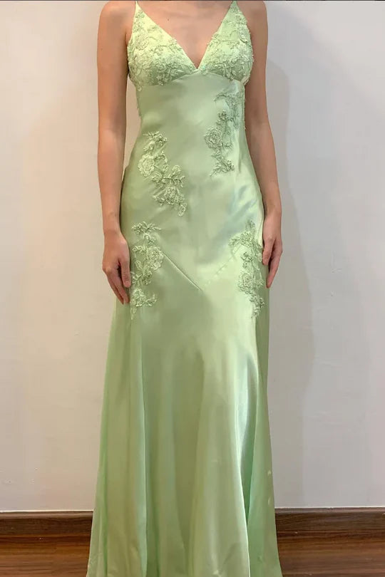 Elegant green satin A-line prom dress with V-neck and straps.