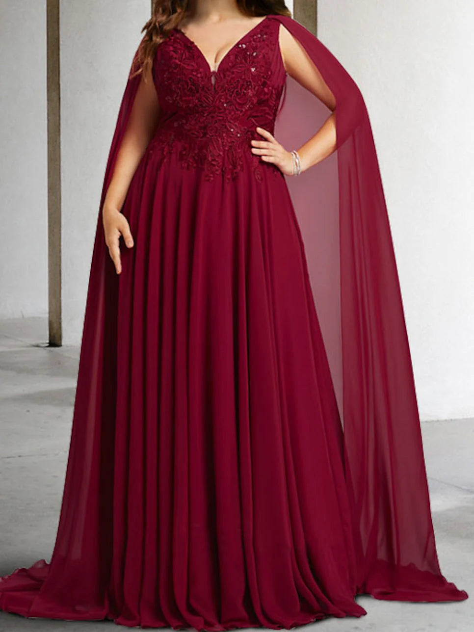 Elegant A-line V-neck maxi dress with delicate applique, perfect for a Mother of the Bride.
