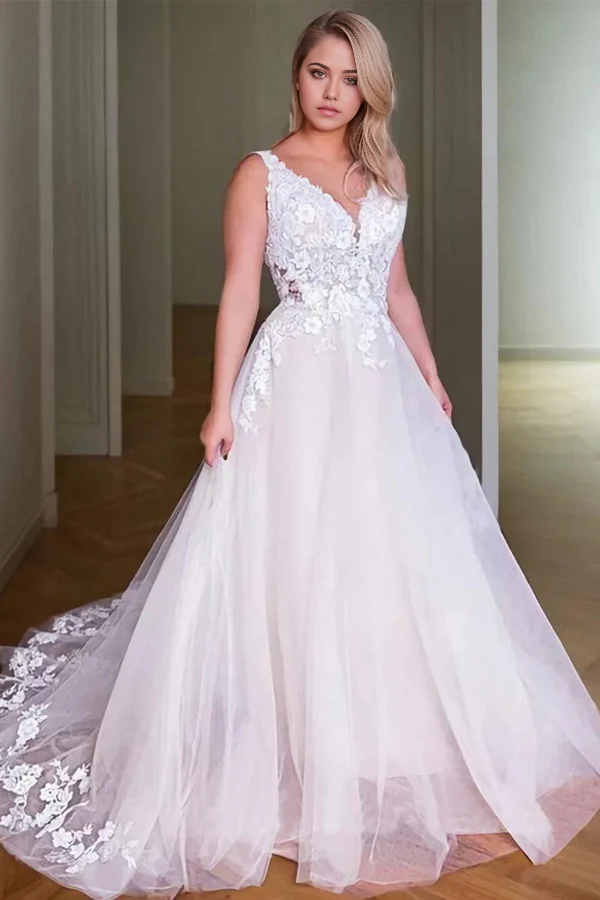 Elegant A-line V-neck wedding dress with lace appliques and a sweep train.