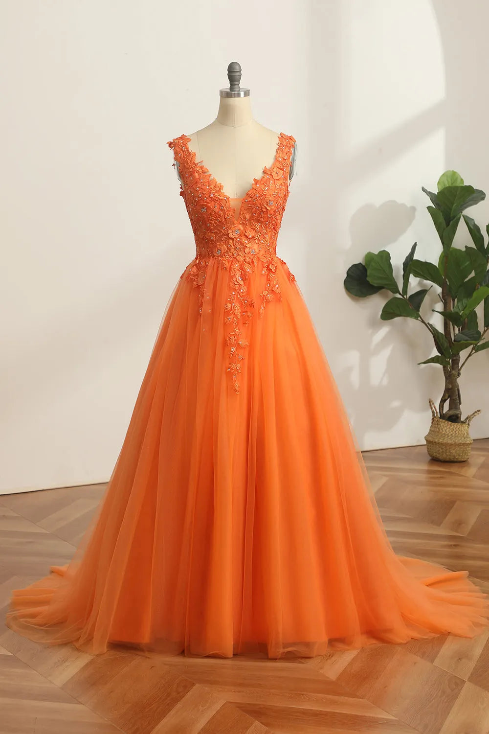 Elegant A-line V-neck long prom dress with appliques.