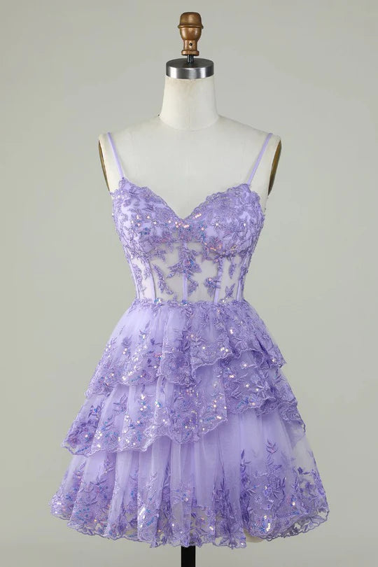 Lavender A-Line tulle homecoming dress with applique and straps.