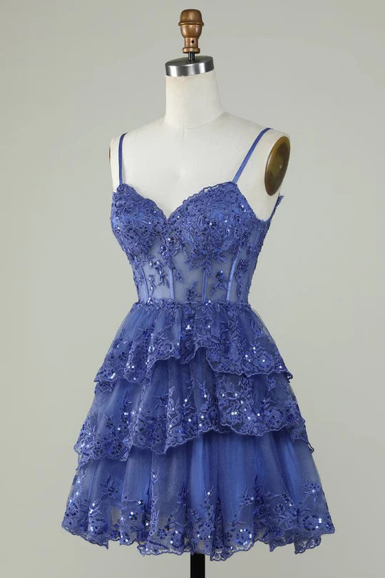 Back view of blue A-Line tulle homecoming dress with straps.