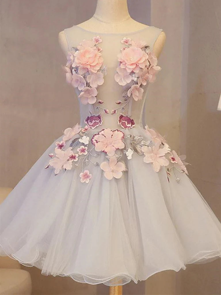 Front view of a sleeveless A-line V-neck short homecoming dress with floral appliques.