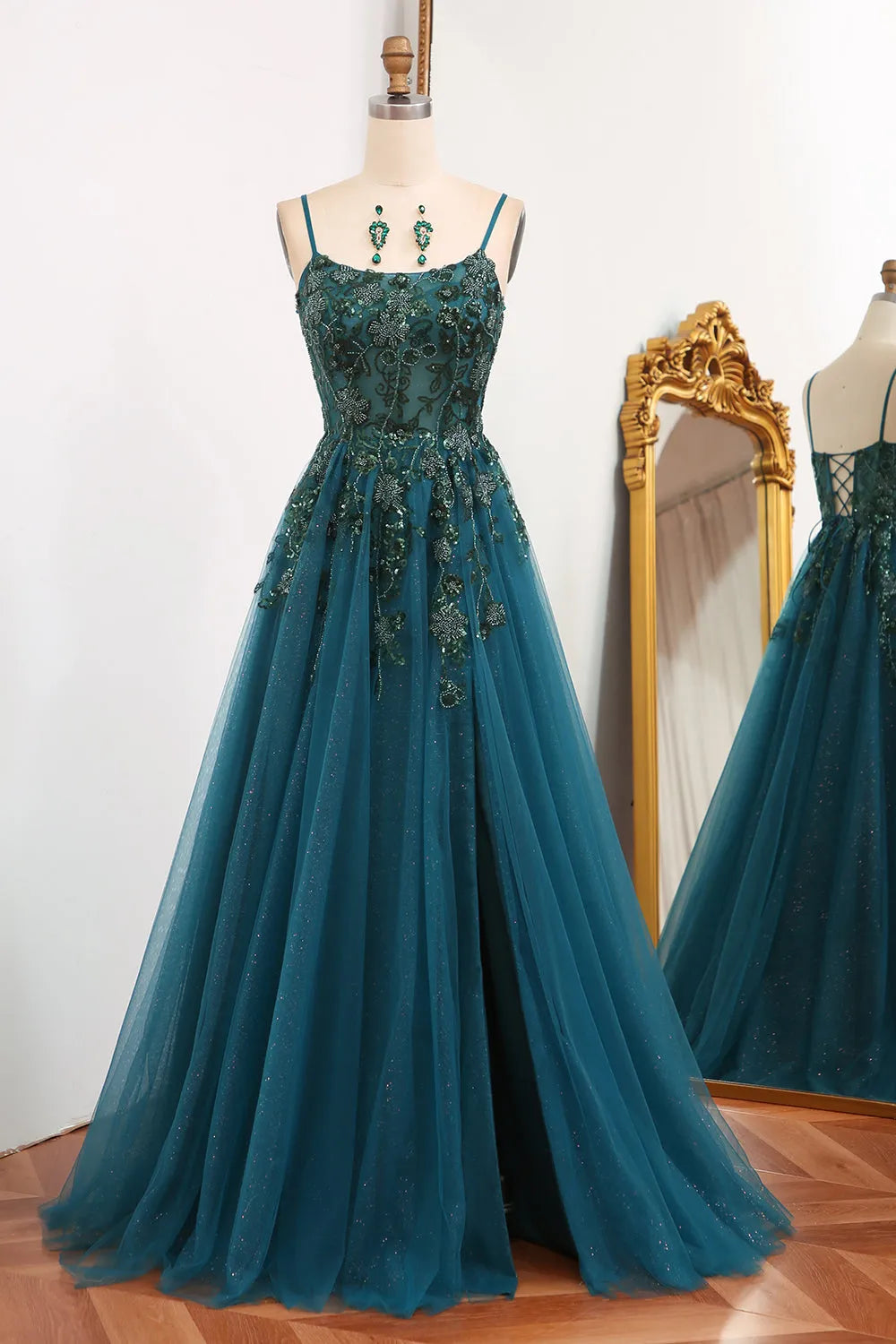 Elegant dark green A-line prom dress with appliques and a high slit.