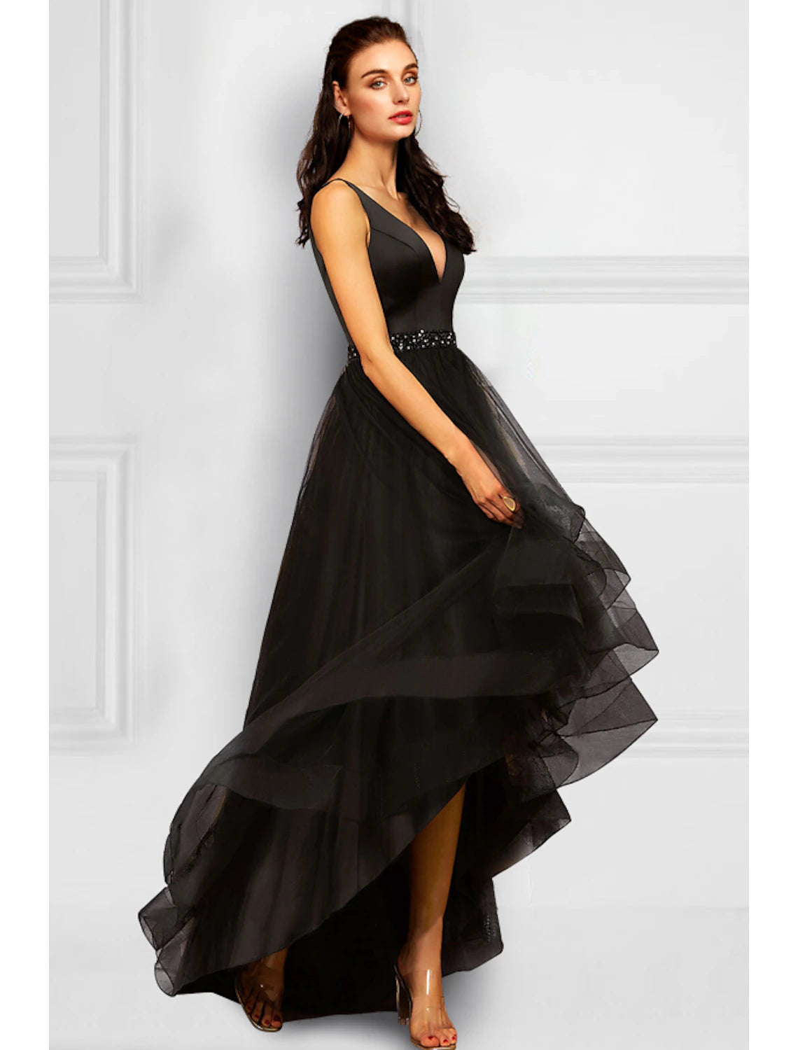 Close-up of rhinestone ruffles on the V-neck cocktail dress.