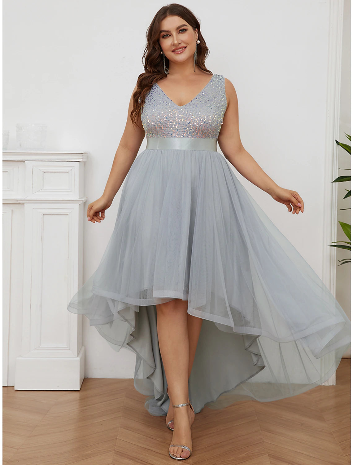 Back view of elegant V-neck sleeveless bridesmaid gown.
