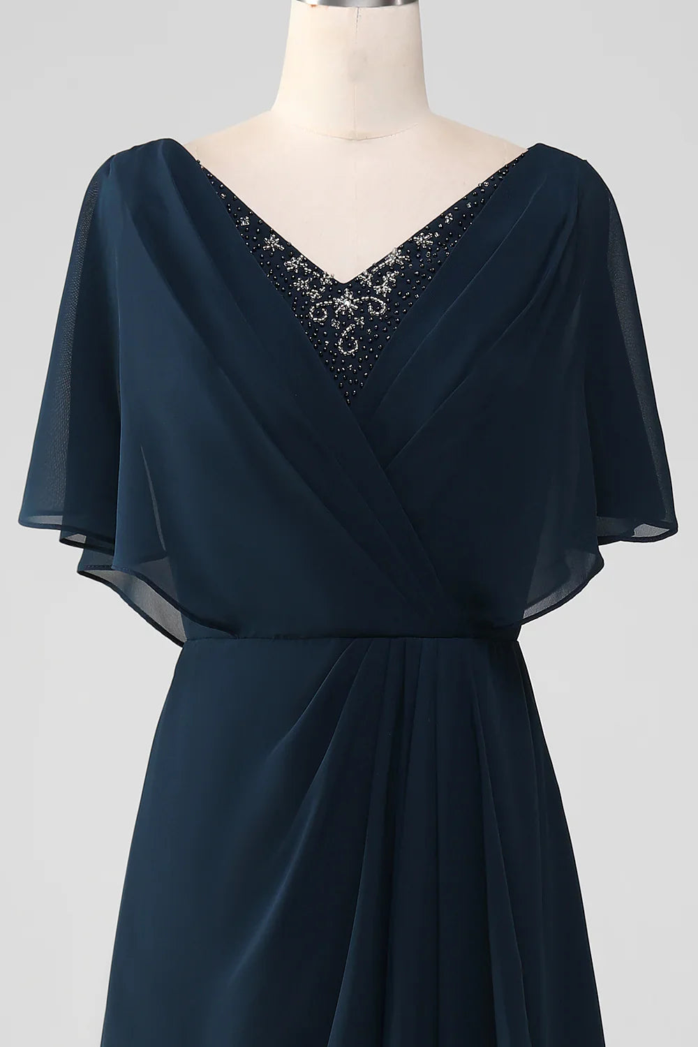 Mother of the Bride dress featuring V-neck and sequin embellishments.