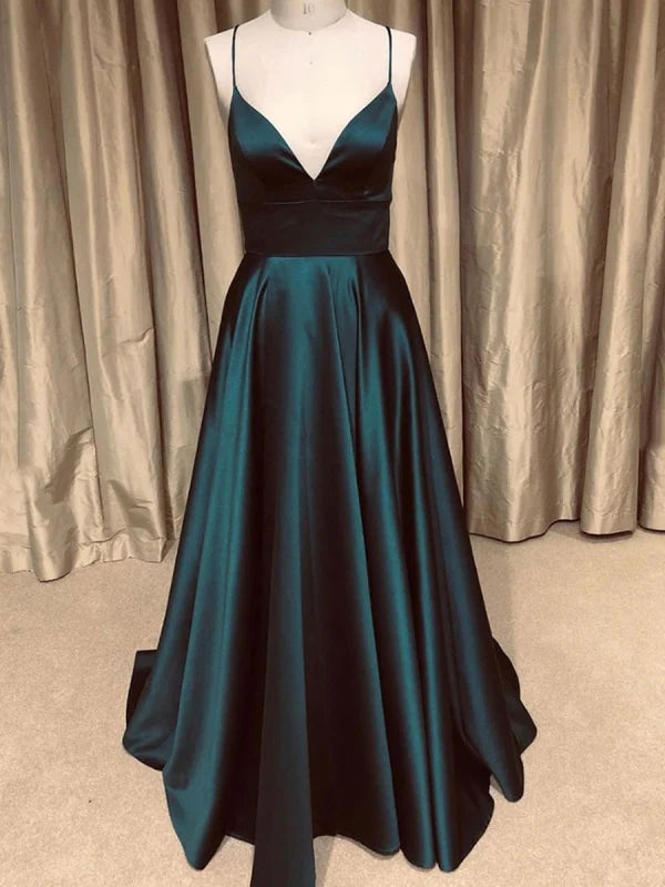 Model wearing an elegant A-line V-neck backless long prom dress.