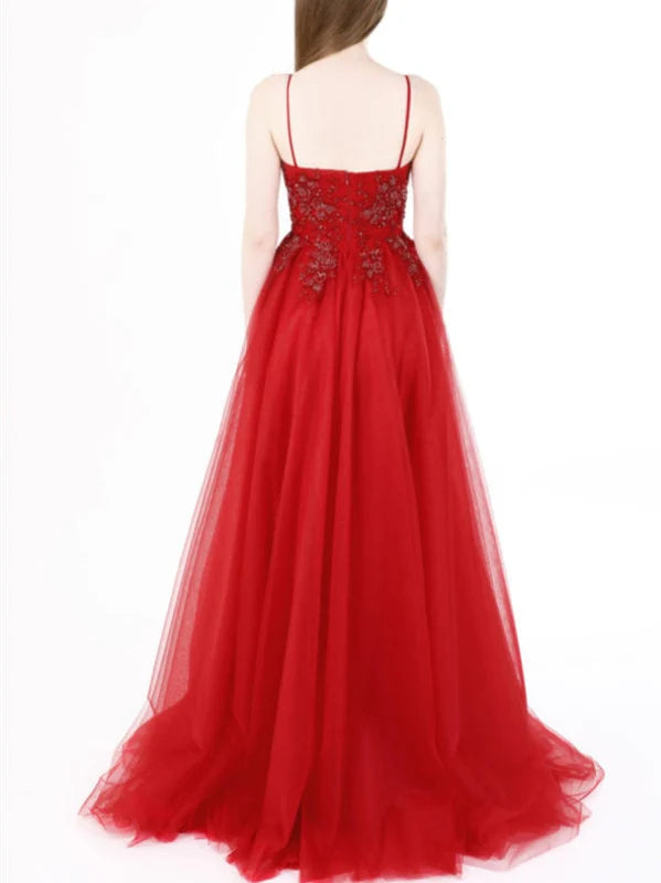 Back view of the A-line V-neck prom dress, showcasing the backless design and intricate lace details.