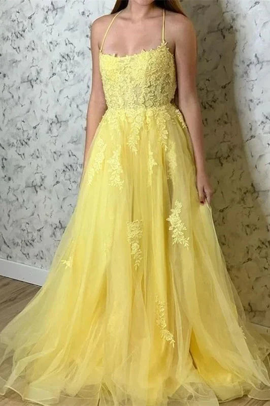 Elegant A-line lace prom dress with spaghetti straps and a high slit.