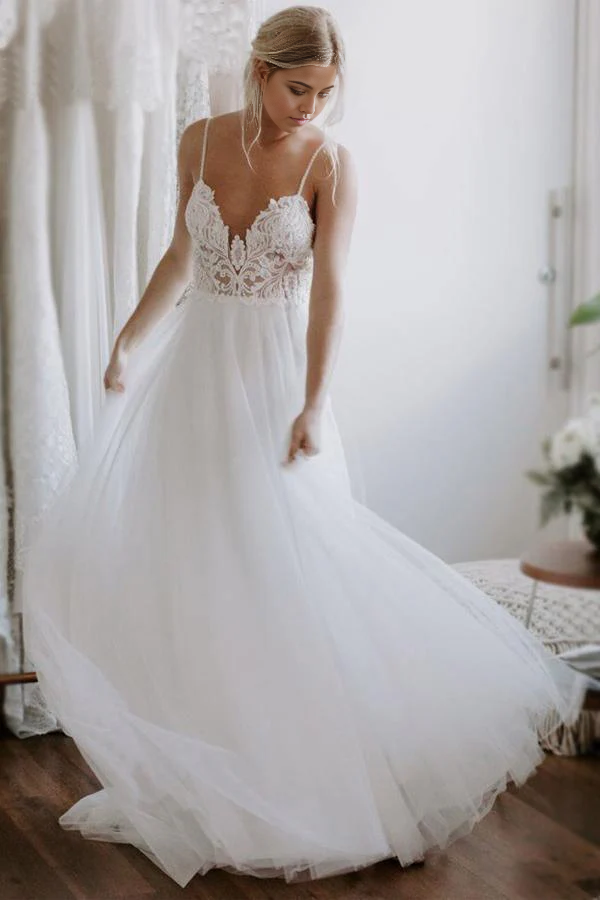 Elegant A-line white wedding dress with lace, V-neck, and backless design.